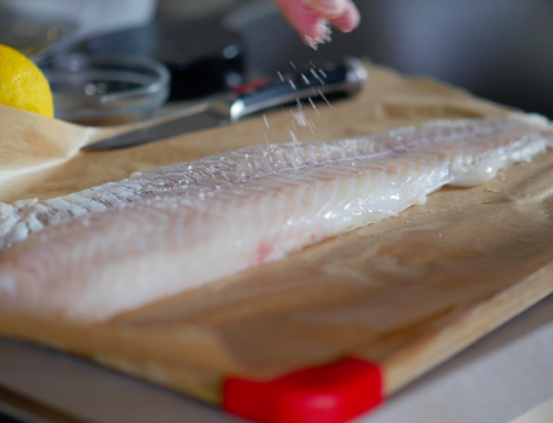 Seasoning and marinating the fillet of cod. Free HD video footage
